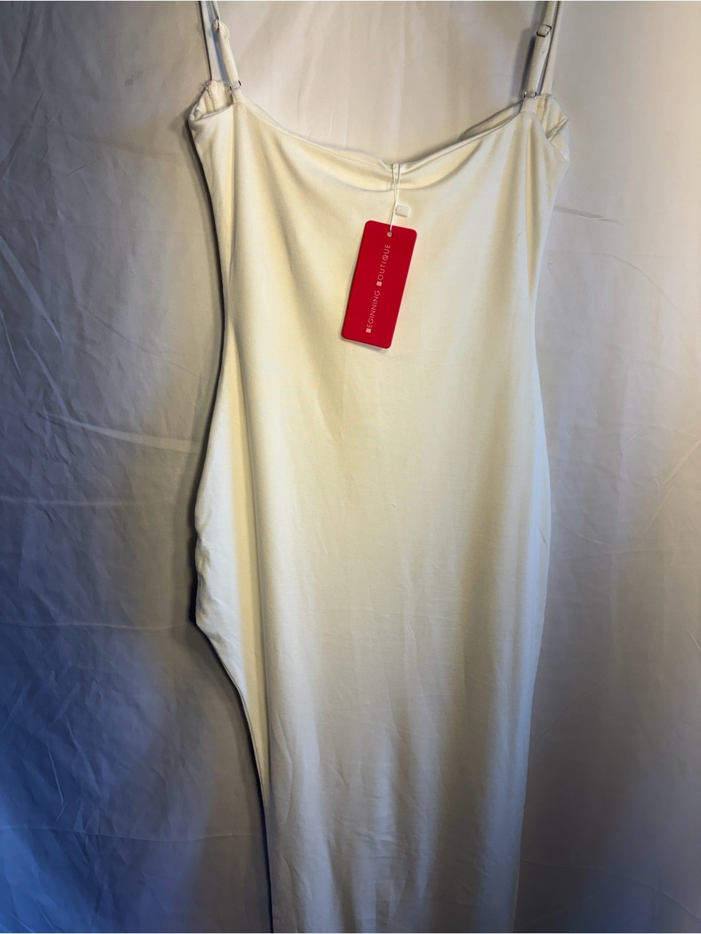 Beginning Boutique Cream Asymmetrical Slip Dress